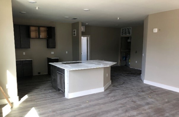 Kitchen island in an apartment that is almost finished. 