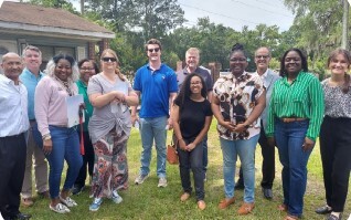 Orange Ave Development Site Visit tour featuring members of THA and community leaders