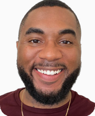 Victor Jean smiles in his headshot.