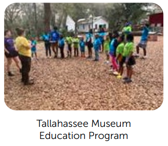 Teachers and children outside.