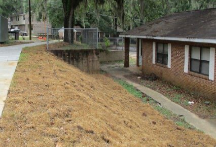 Home exterior with sidewalk.