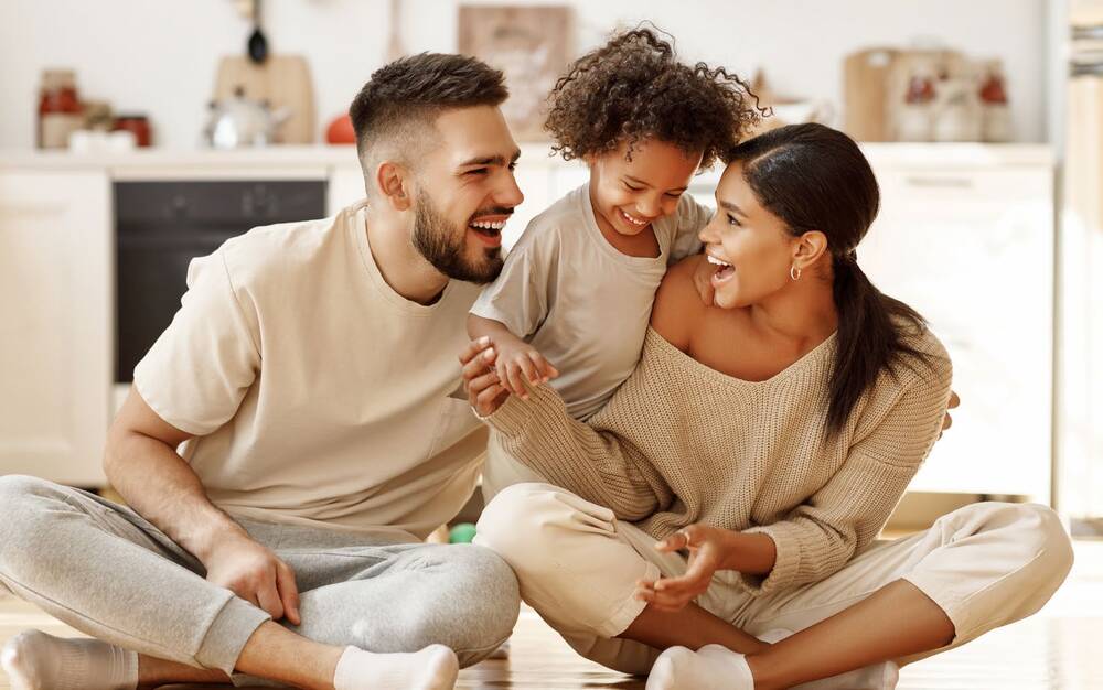 Family laughing together.