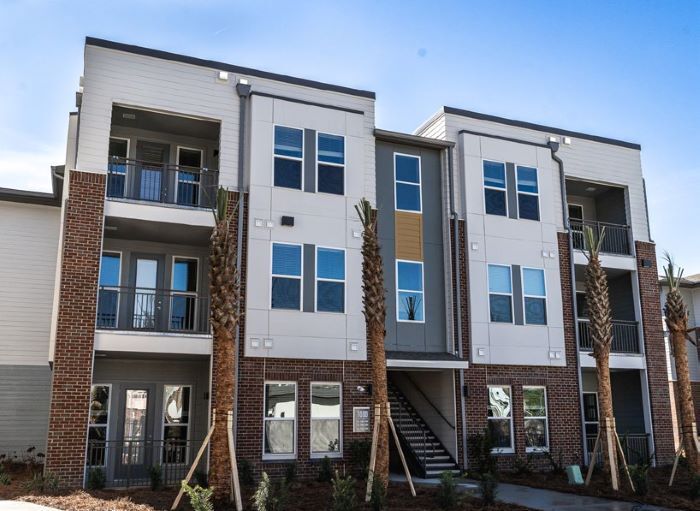 Outdoors image of an apartment building.