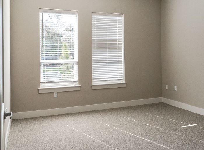 Interior image of an apartment bedroom.