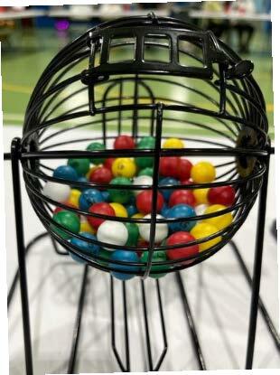 Bingo balls in a cage.