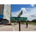 A close up of a street sign that says Ray Charles BLVD 1200