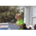 Woman speaking at the podium. 