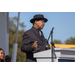Man animatedly talks from the podium.