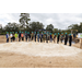 Group with shovels and hard hats. 