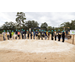 Each person is using shovels to break ground. 