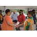 Two women shaking hands at the Orange Avenue site.