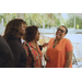 Three women smiling together.