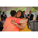 Two women hugging.