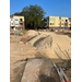 Piles of dirt and sand in front of Orange Avenue construction.