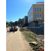 Outdoor construction outside of the Orange Avenue Apartments. 