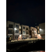 Exteirior view of the apartments at night. 