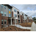 Sidewalk view of newly constructed apartments.