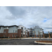 A wide view of newly constructed apartments.