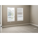 Two large open windows in a room of a new apartment.