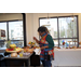 A woman choosing what to eat from the buffet tables. 