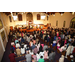 A view of the congregation from behind and above. 
